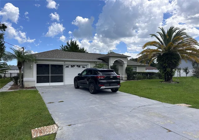1st image of 6 White House Dr, Palm Coast, FL 32164 | MLS# FC320270