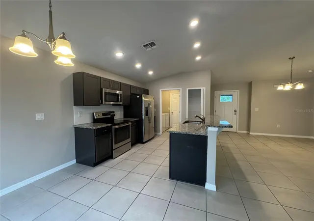 Photo 3 of Single family home for sale at 350 W Aster Ct, Kissimmee, FL 34759 | MLS# P4939440 | Listing updated on 2026-10-21