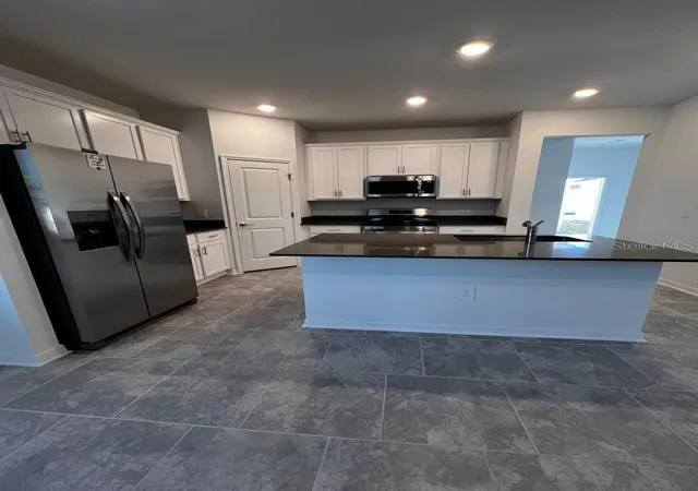 Photo 2 of Single family home for sale at 4134 Pino St, Apopka, FL 32712 | MLS# O6428978 | Listing updated on 2026-08-08