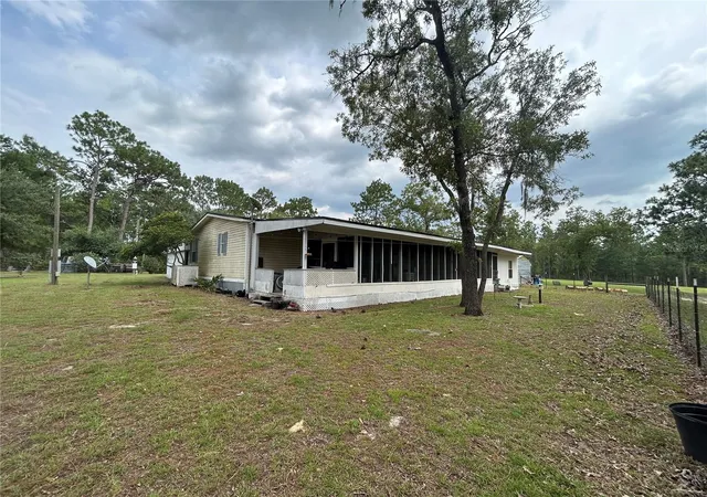 Photo 2 of Manufactured home for sale at 14050 SE 10th Street, Williston, FL 32696 | MLS# OM729378 | Listing updated on 2026-07-29