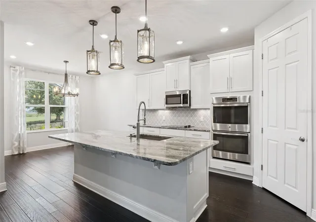 Photo 4 of Single family home for sale at 1511 Gateway Ln, Kissimmee, FL 34746 | MLS# O6429063 | Listing updated on 2026-09-15
