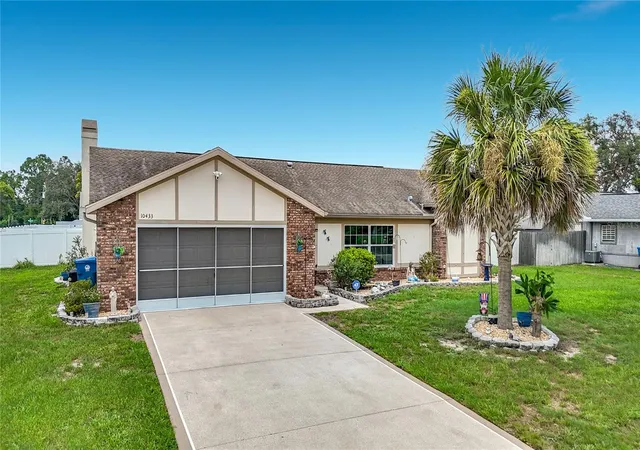 Photo 2 of Single family home for sale at 10433 Dunkirk Rd, Spring Hill, FL 34608 | MLS# W7888073 | Listing updated on 2026-09-06