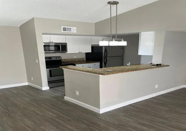Photo 3 of Condo for sale at 5140 Conroy Rd #35, Orlando, FL 32811 | MLS# O6429100 | Listing updated on 2026-08-26