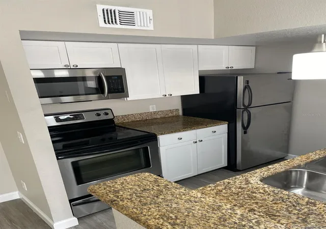 Photo 3 of Condo for sale at 5140 Conroy Rd #35, Orlando, FL 32811 | MLS# O6429100 | Listing updated on 2026-08-26
