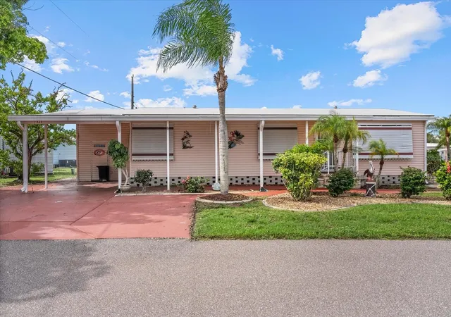 Photo 2 of Manufactured home for sale at 321 Blackburn Blvd, North Port, FL 34287 | MLS# N6145197 | Listing updated on 2026-09-16