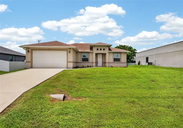 Photo 1 of Single family home for sale at 2714 Nw 1st Place, Cape Coral, FL 33993 | MLS# OM729418 | Listing updated on 2026-10-23
