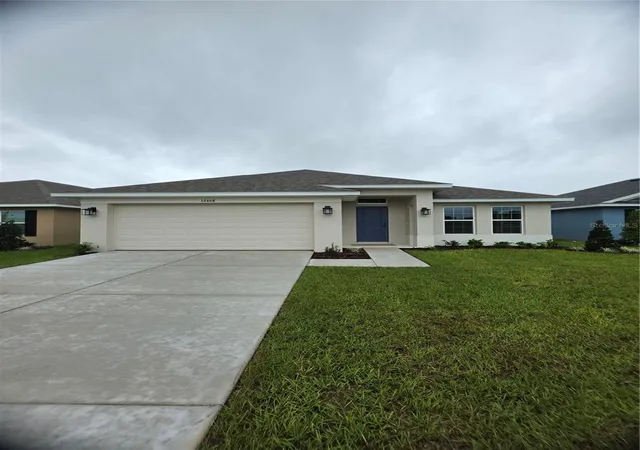 Photo 1 of Single family home for sale at 12468 Langley Dr #Lot 84, Spring Hill, FL 34609 | MLS# OM729435 | Listing updated on 2026-10-08