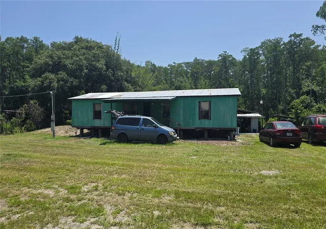 5th image of 135 Starlight Rd, Crescent City, FL 32112 | MLS# OM729445