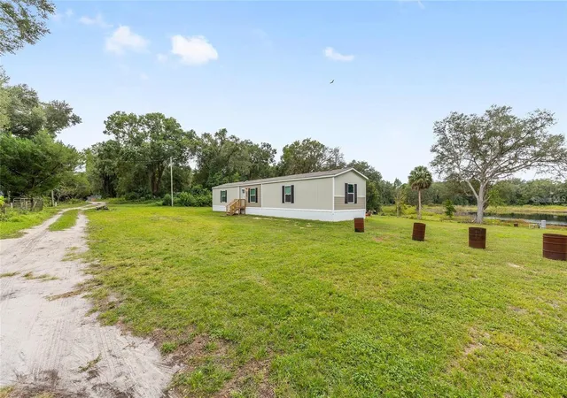 Photo 2 of Sale Pending at 14642 Ne 111th Terrace, Fort Mc Coy, FL 32134 | MLS# OM729453 | Listing updated on 2026-09-21