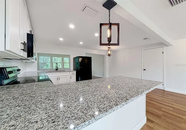Photo 4 of Sale Pending at 6845 Medlar Dr, New Port Richey, FL 34653 | MLS# W7888092 | Listing updated on 2026-09-08
