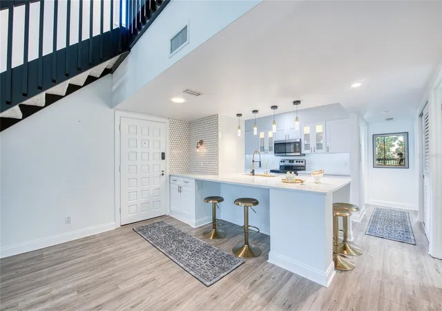 Photo 3 of Condo for sale at 1328 Pelican Crk Xing #D, Saint Petersburg, FL 33707 | MLS# TB8534052 | Listing updated on 2026-10-07