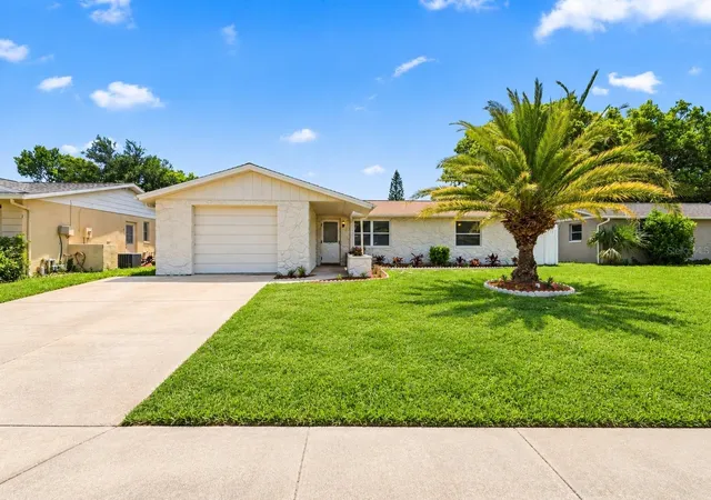 Photo 1 of Single family home for sale at 8936 Windsong Ln, Port Richey, FL 34668 | MLS# W7888098 | Listing updated on 2026-10-01