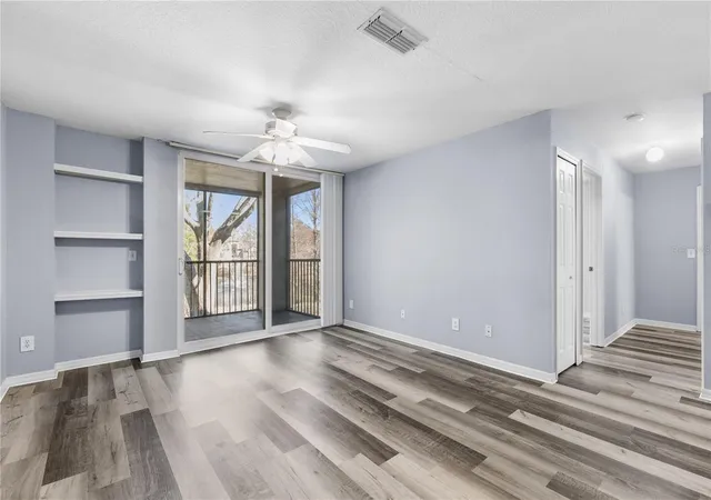 Photo 3 of Condo for sale at 7605 Pissarro Dr #13204, Orlando, FL 32819 | MLS# O6429372 | Listing updated on 2026-09-30