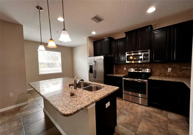 Photo 3 of Townhouse for sale at 8613 Andalucia Fld Dr, Temple Terrace, FL 33637 | MLS# TB8534156 | Listing updated on 2026-10-09