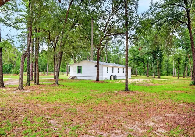4th image of 10890 Ne 102Nd Pl, Archer, FL 32618 | MLS# OM729492