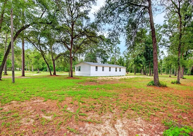 5th image of 10890 Ne 102Nd Pl, Archer, FL 32618 | MLS# OM729492