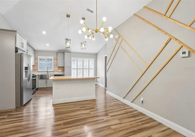 Photo 3 of Single family home for sale at 8711 Busch Oaks St, Tampa, FL 33617 | MLS# TB8534237 | Listing updated on 2026-10-07