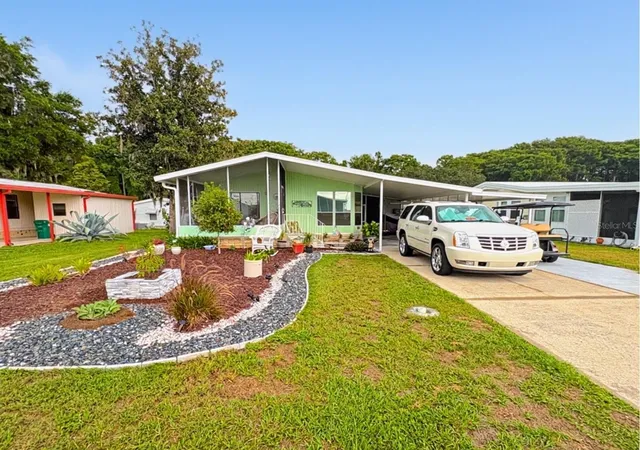 Photo 1 of Manufactured home for sale at 413 S Timber Trl, Wildwood, FL 34785 | MLS# G5115784 | Listing updated on 2026-07-31
