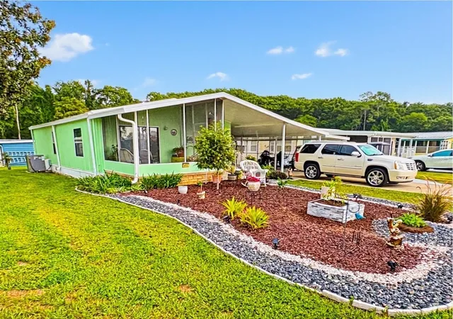 Photo 2 of Manufactured home for sale at 413 S Timber Trl, Wildwood, FL 34785 | MLS# G5115784 | Listing updated on 2026-07-31