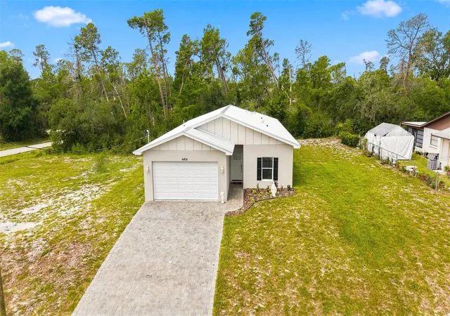 Photo 3 of Single family home for sale at 6454 Freeport Dr, Spring Hill, FL 34608 | MLS# W7888113 | Listing updated on 2026-09-07