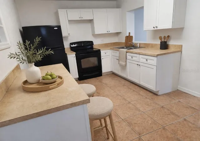 Photo 3 of Single family home for sale at 1005 N Bracewell Dr, Plant City, FL 33563 | MLS# TB8534334 | Listing updated on 2026-08-11