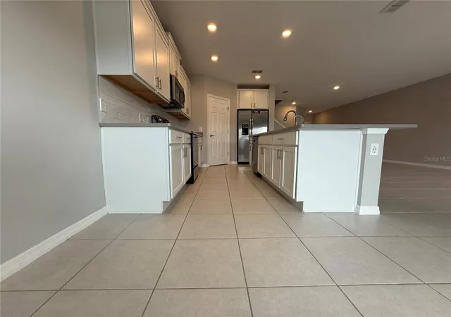 Photo 4 of Townhouse for sale at 3363 Bellezza Ct, Kissimmee, FL 34746 | MLS# O6429510 | Listing updated on 2026-10-27