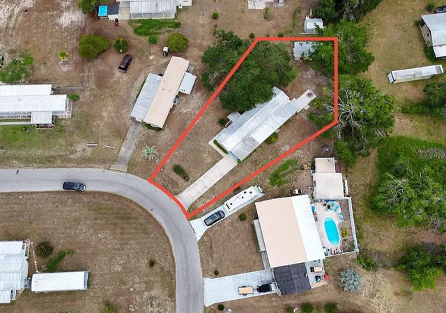 Photo 2 of Manufactured home for sale at 10113 SE 24th Drive, Webster, FL 33597 | MLS# G5115804 | Listing updated on 2026-09-07