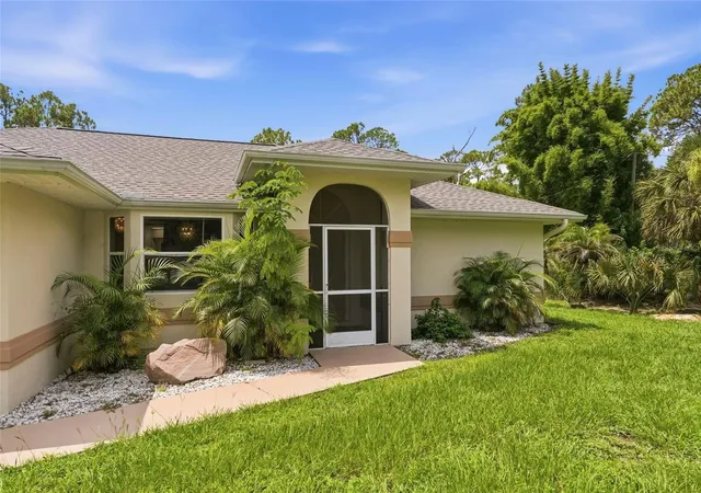 Photo 3 of Single family home for sale at 2209 Tropicaire Blvd, North Port, FL 34286 | MLS# TB8534448 | Listing updated on 2026-10-08