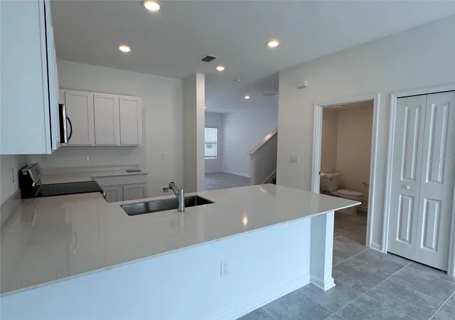 Photo 4 of Townhouse for sale at 2494 Skyline Loop, Kissimmee, FL 34758 | MLS# O6429616 | Listing updated on 2026-08-07