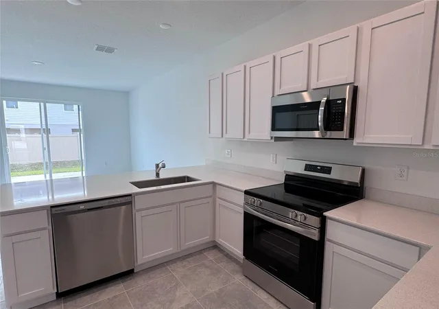 Photo 5 of Townhouse for sale at 2494 Skyline Loop, Kissimmee, FL 34758 | MLS# O6429616 | Listing updated on 2026-08-07