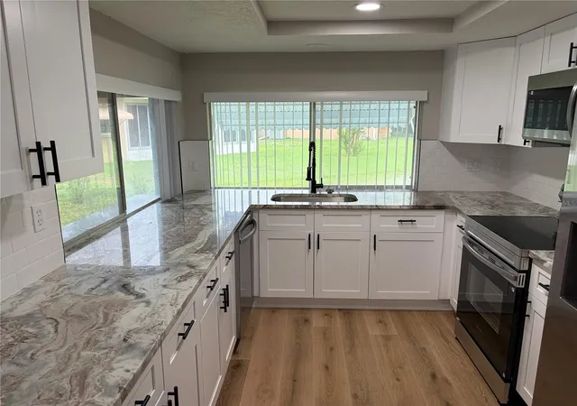 Photo 3 of Single family home for sale at 12302 Fieldstone Ln, Hudson, FL 34667 | MLS# W7888138 | Listing updated on 2026-10-04