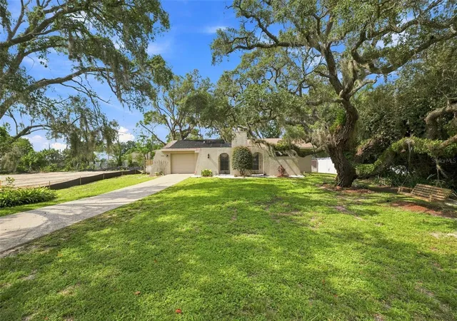 Photo 2 of Single family home for sale at 400 Fairbanks Rd, Spring Hill, FL 34608 | MLS# TB8534503 | Listing updated on 2026-08-31