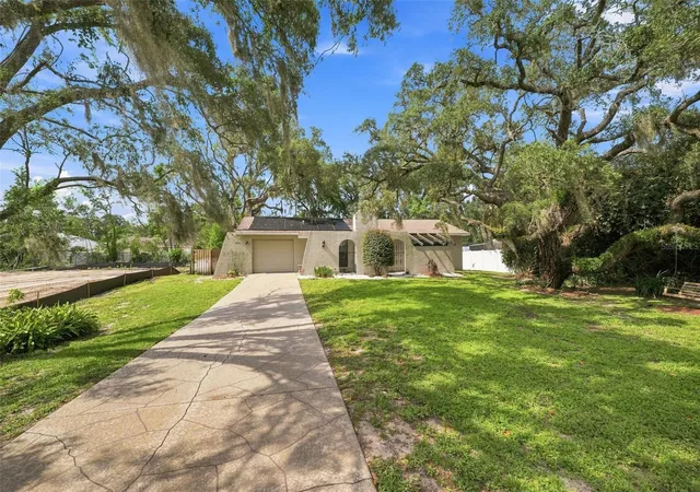 Photo 3 of Single family home for sale at 400 Fairbanks Rd, Spring Hill, FL 34608 | MLS# TB8534503 | Listing updated on 2026-08-31