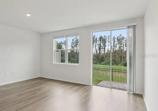 Photo 3 of Townhouse for sale at 16257 Bird Of Paradise Ave, Clermont, FL 34714 | MLS# TB8534546 | Listing updated on 2026-08-21