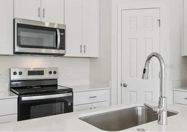 Photo 5 of Townhouse for sale at 16257 Bird Of Paradise Ave, Clermont, FL 34714 | MLS# TB8534546 | Listing updated on 2026-08-21
