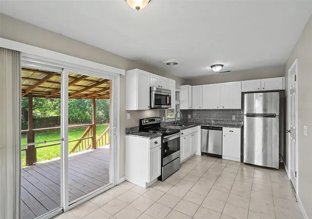 Photo 2 of Single family home for sale at 4406 Urban Ct, Orlando, FL 32810 | MLS# O6429711 | Listing updated on 2026-09-03