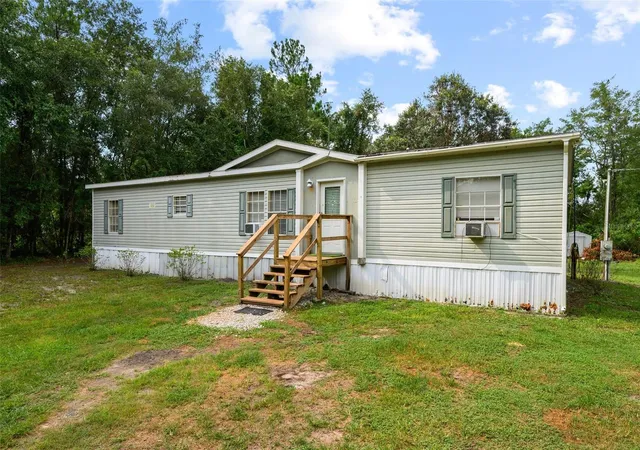 Photo 2 of Manufactured home for sale at 9798 State Rd 100 W, Starke, FL 32091 | MLS# GC542376 | Listing updated on 2026-08-27