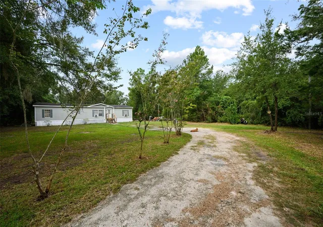 Photo 2 of Manufactured home for sale at 9798 State Rd 100 W, Starke, FL 32091 | MLS# GC542376 | Listing updated on 2026-08-27