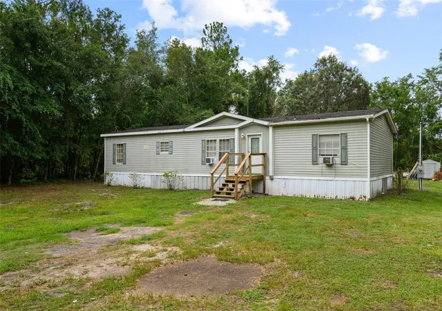 Photo 4 of Manufactured home for sale at 9798 State Rd 100 W, Starke, FL 32091 | MLS# GC542376 | Listing updated on 2026-08-27