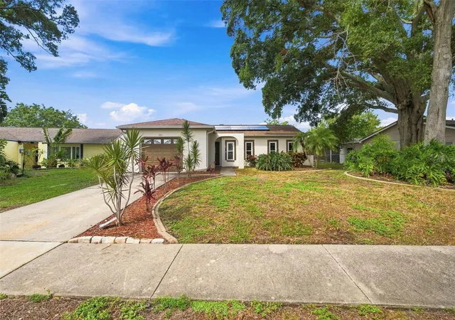 Photo 2 of Single family home for sale at 2460 Beacon Groves Blvd, Palm Harbor, FL 34683 | MLS# W7888142 | Listing updated on 2026-09-13