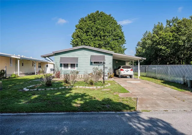 Photo 1 of Manufactured home for sale at 489 Village Cir Sw, Winter Haven, FL 33880 | MLS# TB8534615 | Listing updated on 2026-08-03