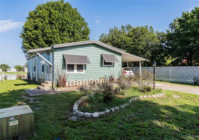 Photo 3 of Manufactured home for sale at 489 Village Cir SW, Winter Haven, FL 33880 | MLS# TB8534615 | Listing updated on 2026-08-03
