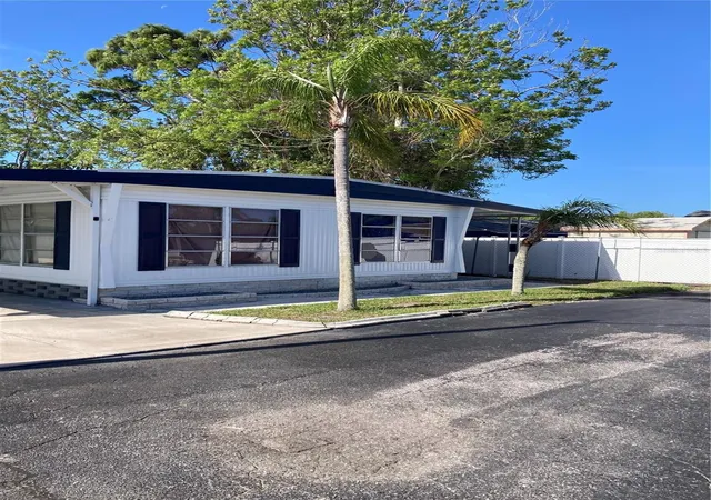 3rd image of 3212 W Tiki Dr, Holiday, FL 34691 | MLS# TB8534620
