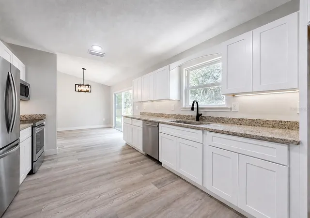 Photo 3 of Single family home for sale at 12728 Se 102nd Terrace, Belleview, FL 34420 | MLS# OM729568 | Listing updated on 2026-09-14