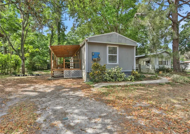 Photo 2 of Manufactured home for sale at 9132 Mango St, New Port Richey, FL 34654 | MLS# W7888159 | Listing updated on 2026-08-26