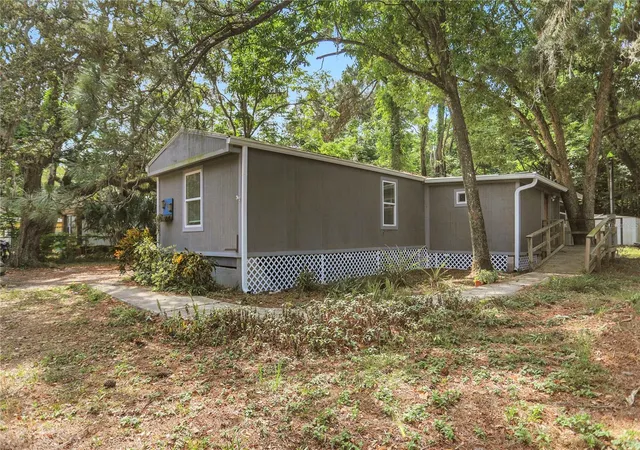 Photo 4 of Manufactured home for sale at 9132 Mango St, New Port Richey, FL 34654 | MLS# W7888159 | Listing updated on 2026-08-26