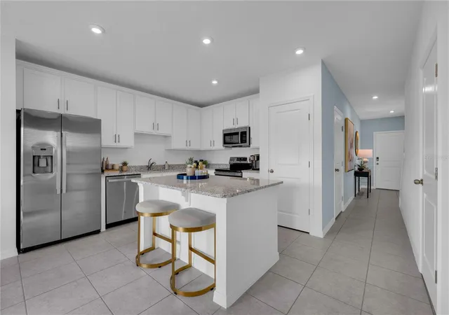 Photo 4 of Townhouse for sale at 228 Cuban Royal Palm Way, Davenport, FL 33897 | MLS# O6429867 | Listing updated on 2026-10-05