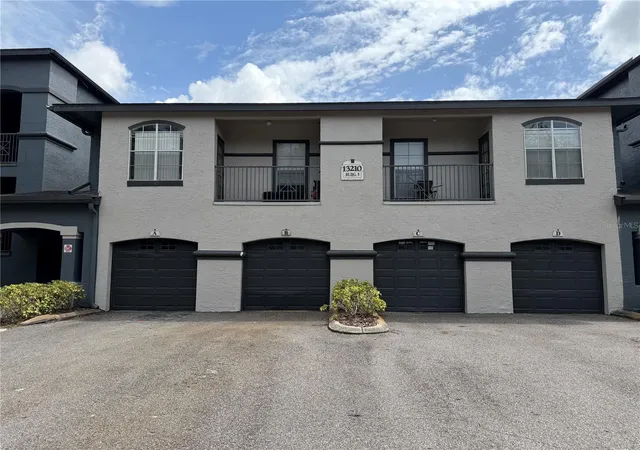 1st image of 13210 Arbor Isle Dr #102, Temple Terrace, FL 33637 | MLS# TB8534901