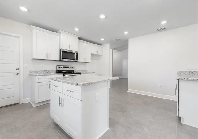 Photo 2 of Single family home for sale at 424 Underwood Trl, Palm Coast, FL 32164 | MLS# FC320377 | Listing updated on 2026-08-05