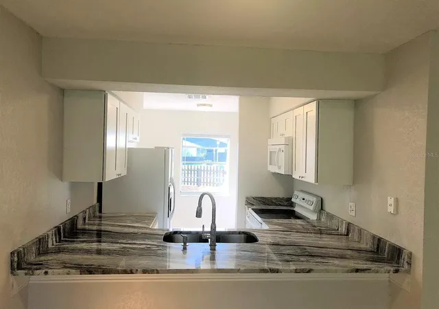 Photo 2 of Townhouse for sale at 10109 Blazed Tree Ct, Orlando, FL 32821 | MLS# O6430002 | Listing updated on 2026-08-02